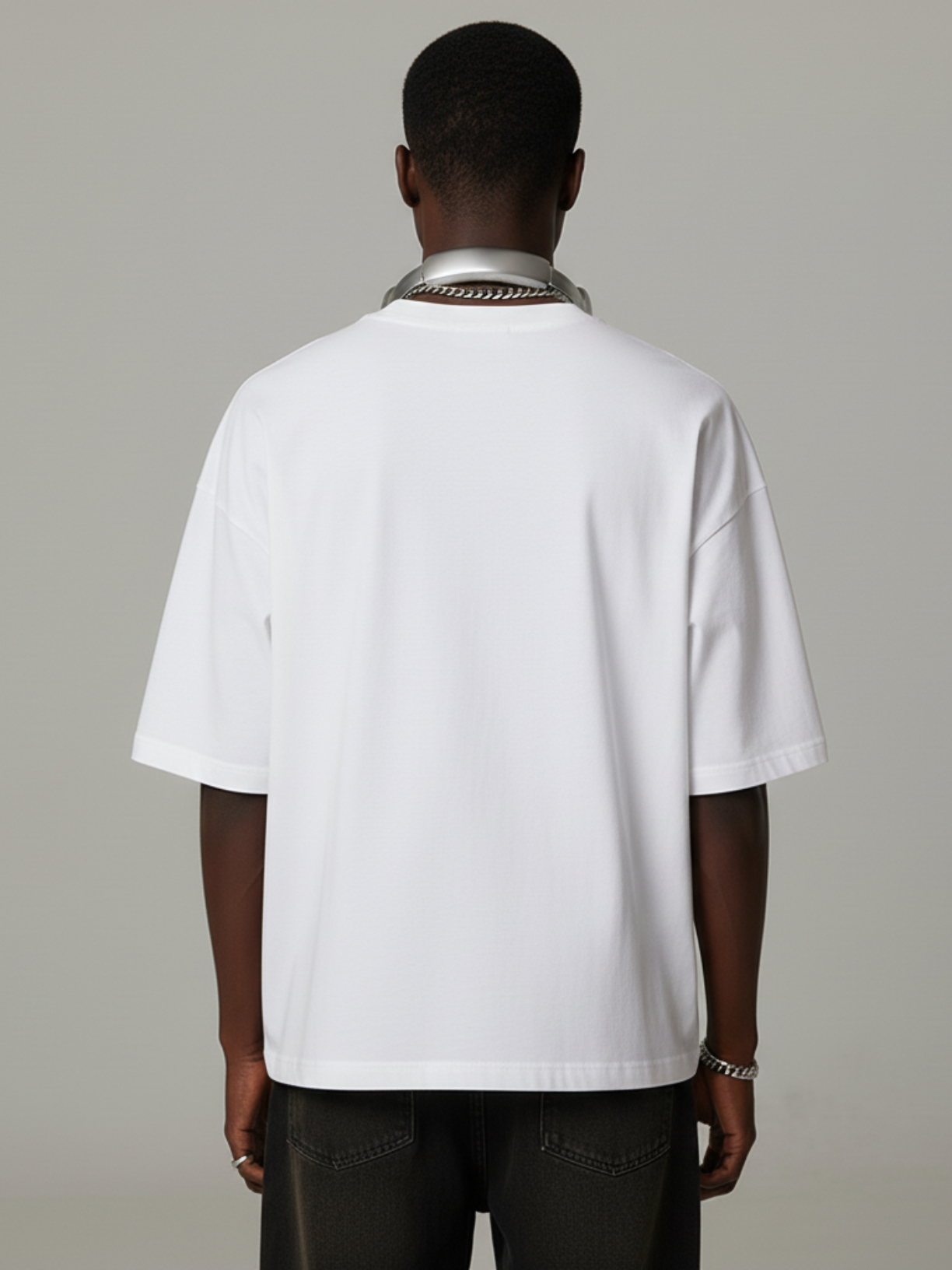 Aero boxy crop tee in white by Apollo Moda, front view on a grey background