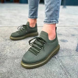 Torino Emerald Allure low-top knit sneaker in green by Apollo Moda, view 2